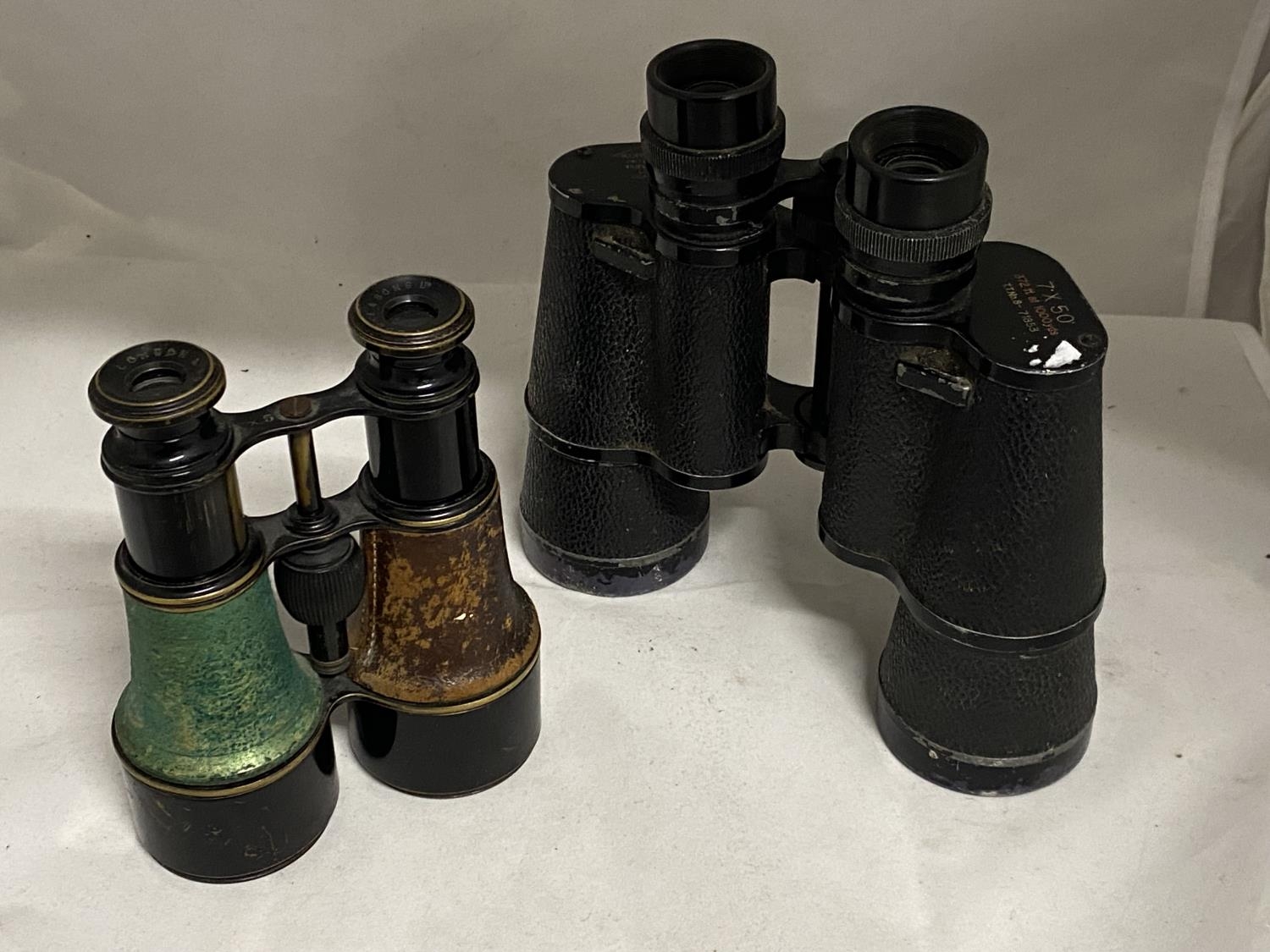 Two pairs of vintage binoculars one by Kurt Muller