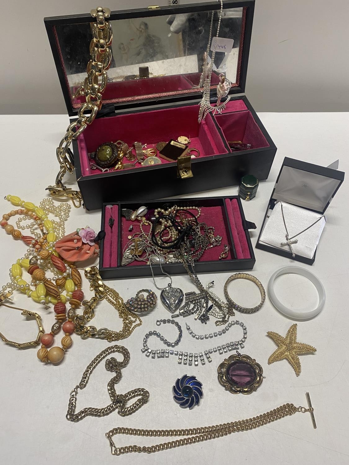 A jewellery box and contents of costume jewellery