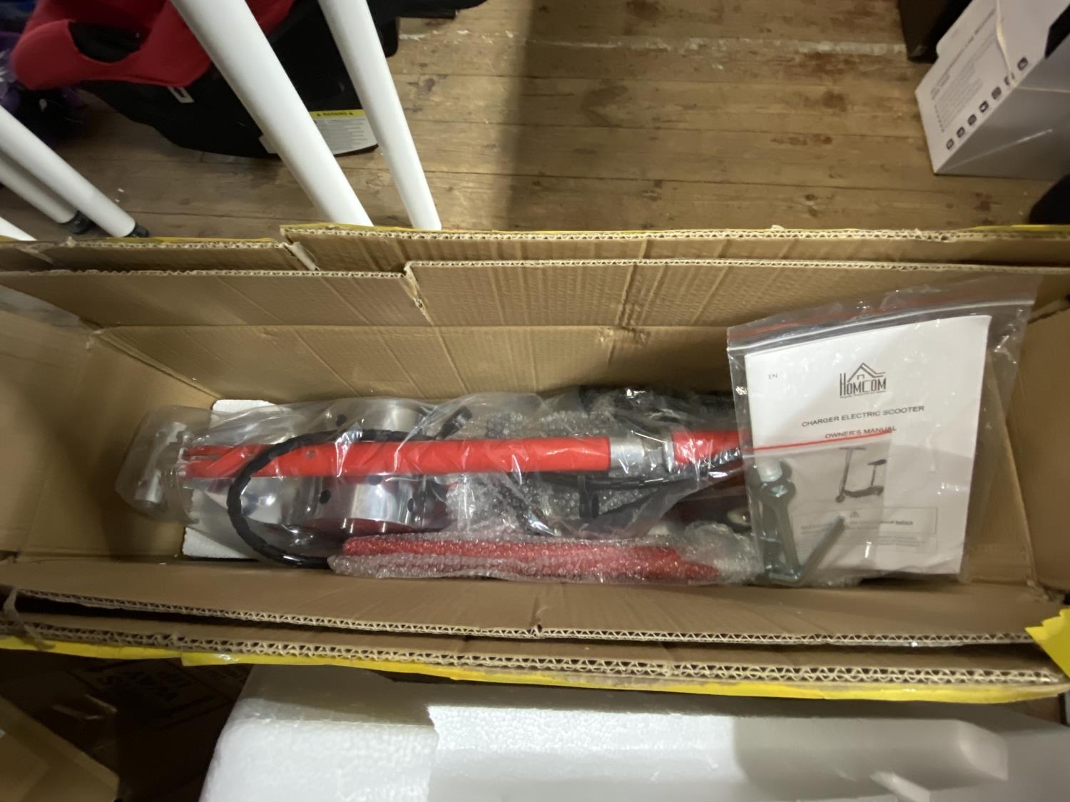 A boxed as new electric scooter, shipping unavailable