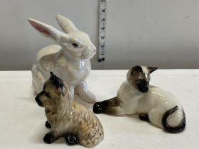 A Beswick Siamese cat, Sylvac dog and a ceramic rabbit