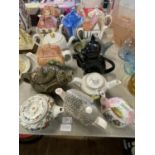 A selection of assorted collectable teapots including Sadler