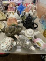 A selection of assorted collectable teapots including Sadler