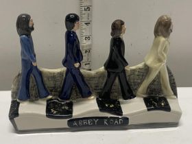 A Manor Collectibles Staffordshire Beatles Abbey Road ceramic figural group