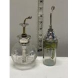 Two silver topped atomizer spray bottles