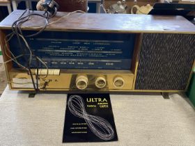 A vintage Ultra AM/FM table radio in working order, shipping unavailable