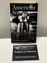 A Oscar de la Hoya book signed with COA