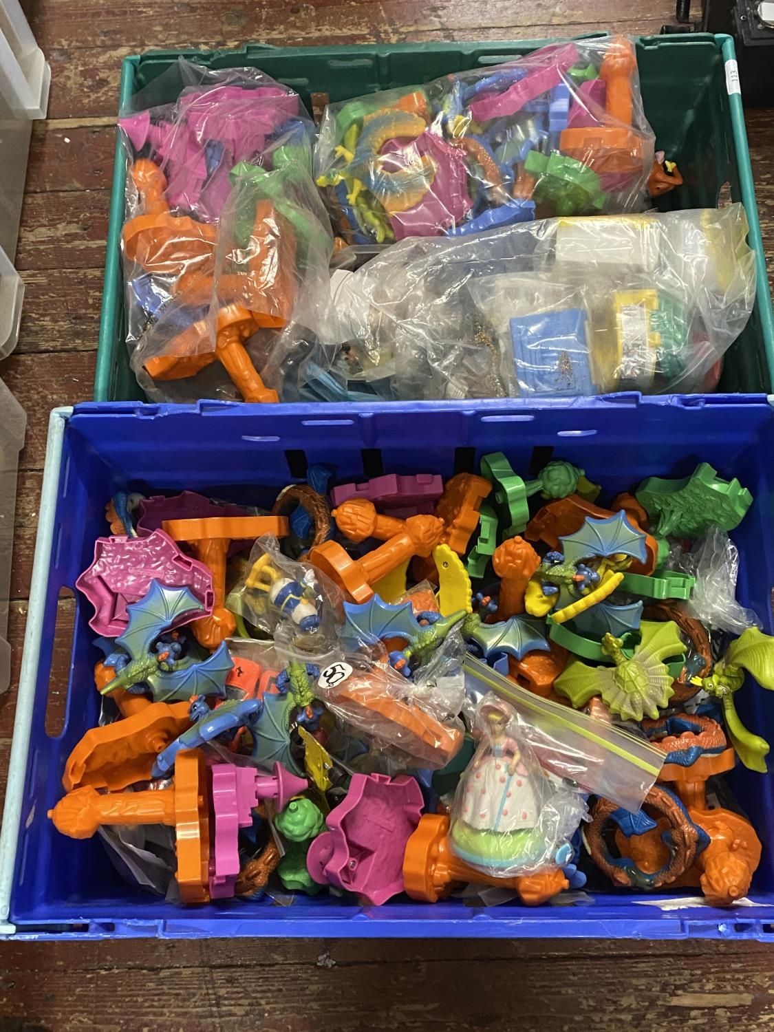 Two boxes full of assorted Mcdonalds Happy Meal toys