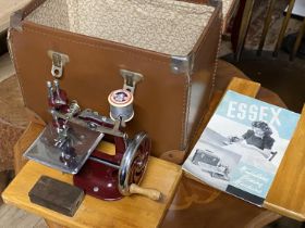 A boxed miniature Essex sewing machine