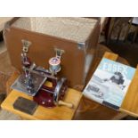 A boxed miniature Essex sewing machine