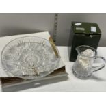 A boxed cut glass dish and jug retailed by Harrods of London