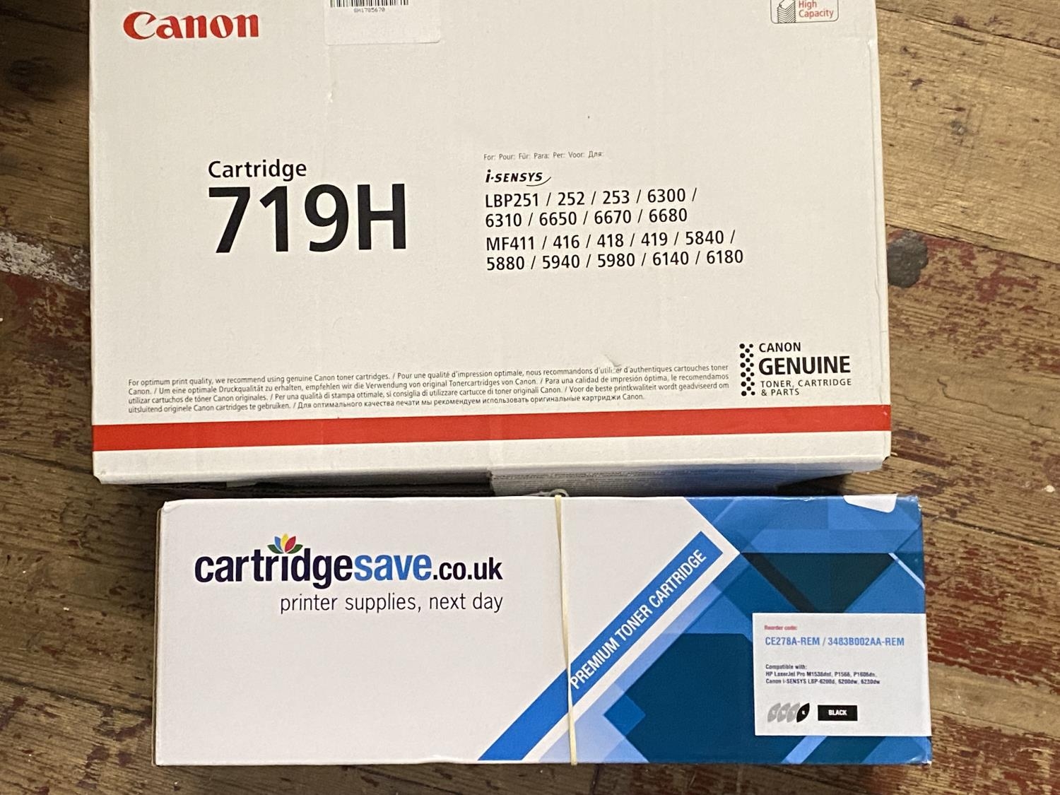 Two boxed printer cartridges