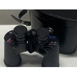 A cased pair of Swift 8x40 binoculars