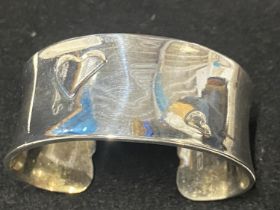 A stamped 925 silver bangle