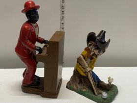 A vintage ceramic figure and a wooden figure of a cowboy