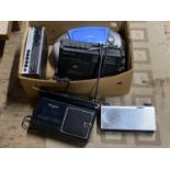 A box of assorted radios, CD players etc