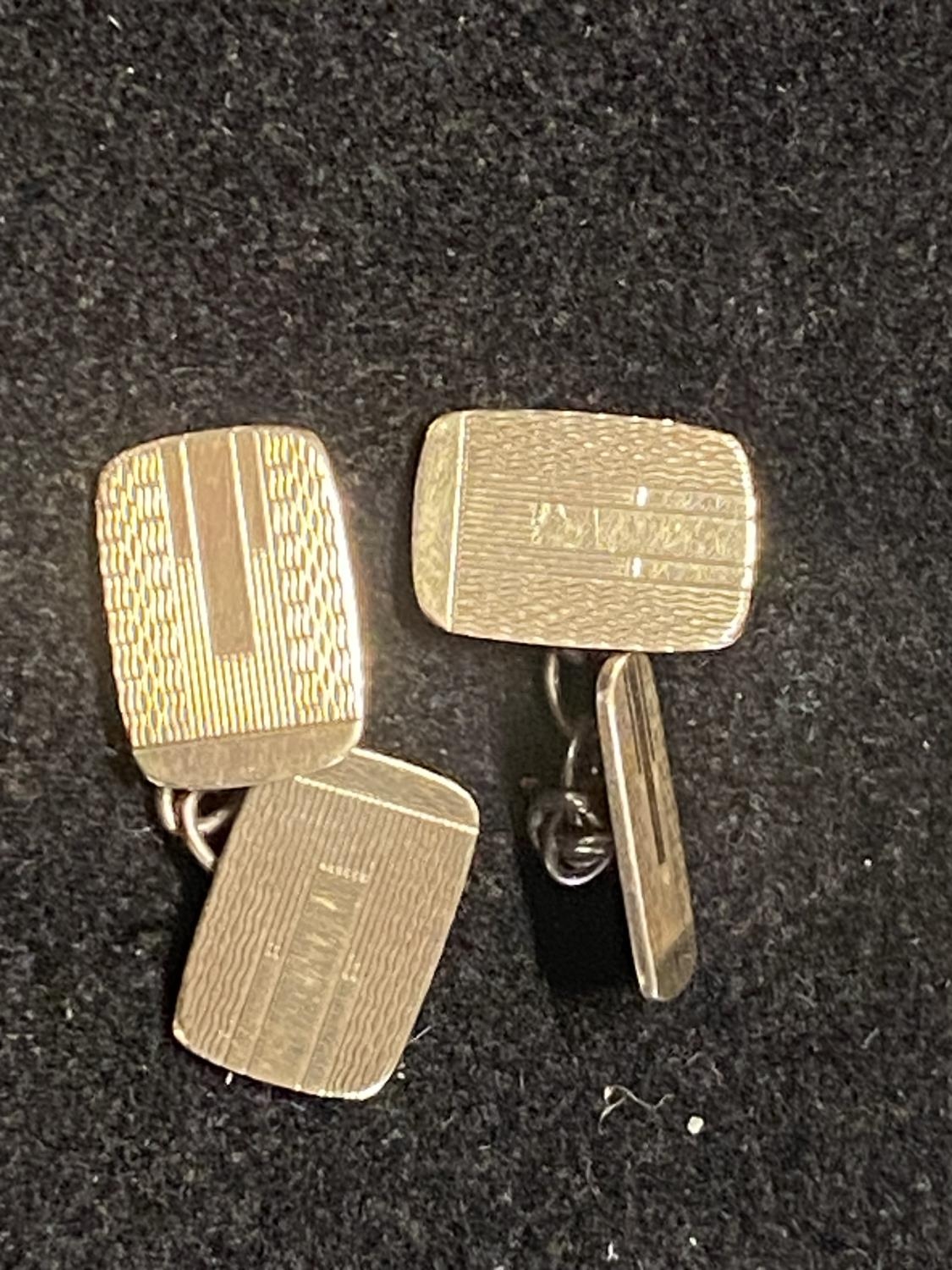 A pair of gold plated on silver cufflinks