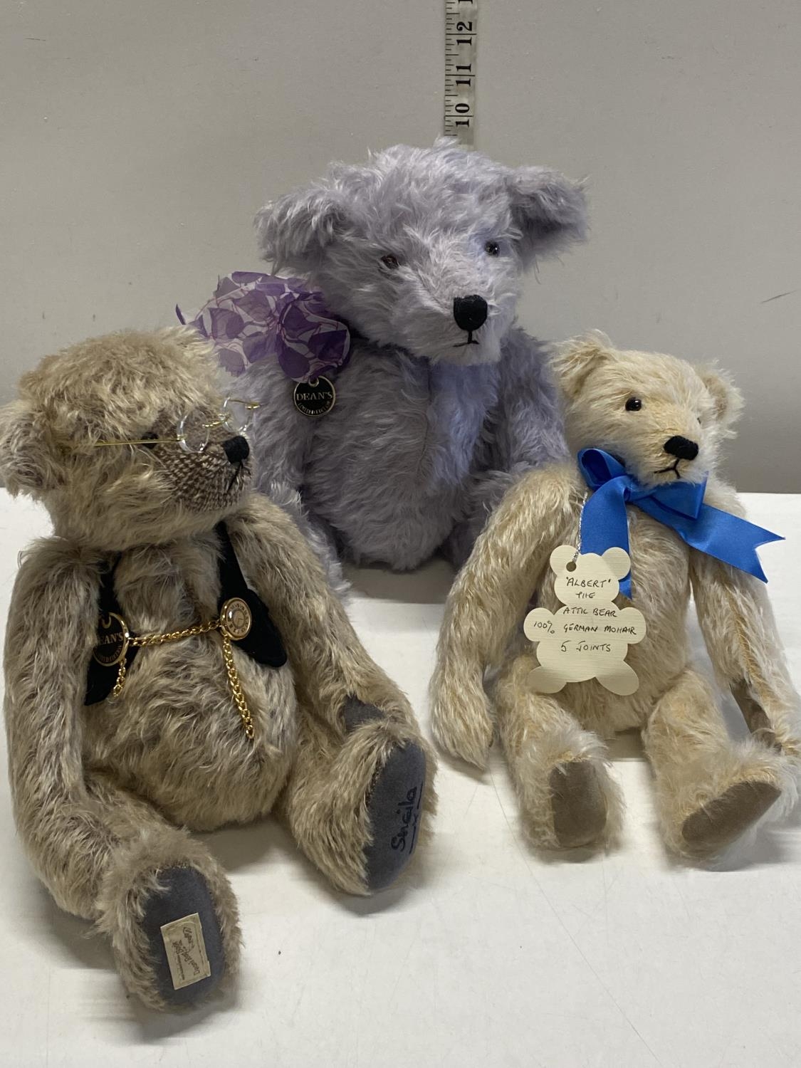 Three assorted bears including two Deans Bears, one limited edition with growler