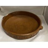 A Victorian terracotta and brown glazed cooking vessel d34cm, signed J POLLS shipping unavailable