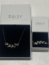 Two boxed Daisy 925 silver pieces of jewellery