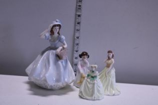 A selection of assorted Coalport and Royal Doulton figurines