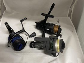 Three assorted carp fishing reels