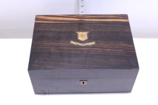 A wooden casket/box with no key present external dimensions are: 28cm x 20cm x 12cm.