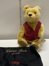 A large limited edition Steiff Winnie the Pooh bear with growler