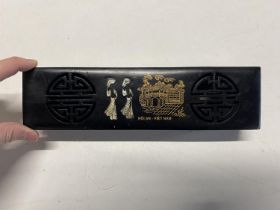 A vintage Vietnamese ebonized wooden box containing chopsticks with MOP inlay