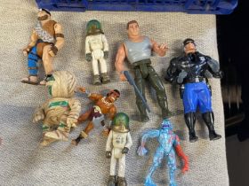 A selection of vintage action figures including Terminator