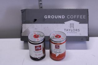 Two tins of Illy coffee and a box of Taylors ground coffee