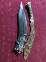 A sheathed vintage Kukri knife, UK shipping only