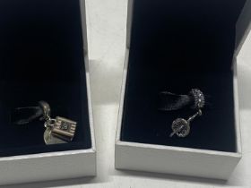 Two boxed Pandora charms