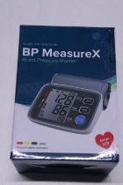 A boxed blood pressure monitor (untested)