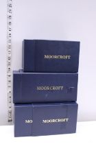 Three empty Moorcroft boxes