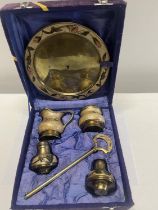 A antique boxed brass condiment set