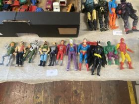 A selection of vintage action figures including 1980's DC figures