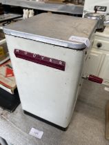 A vintage child's metal Hoover washing machine