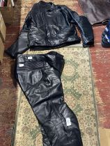 A Frank Thomas motor bike jacket size 42 and trousers size 34