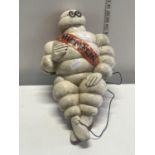 A vintage fibreglass Michelin Man figure