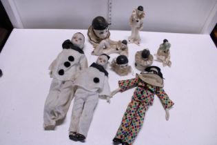 A job lot of assorted ceramic Pierrot figures etc