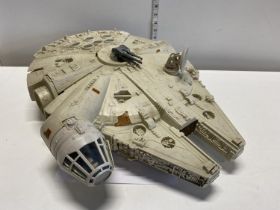 A 1979 Star Wars Millennium Falcon model, with spares