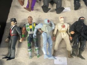 A selection of vintage action figures including GI Joe