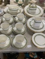 A large comprehensive Royal Doulton dinner service in the Rondley pattern approx 35 pieces, shipping