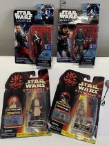 Four carded Star Wars figures