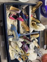 A large selection of novelty "Just The Right Shoe" shoes