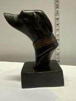 A heavy bronze bust of a dog. 21 cm tall.