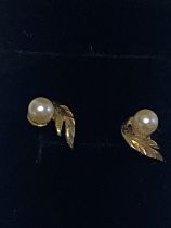 A pair of test for 9ct yellow gold & pearl earrings.