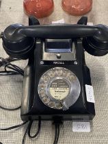 A antique bakelite telephone