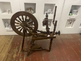 A large and well made vintage spinning wheel. 104cm tall x 100cm long. shipping unavailable