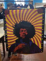 Two collectible music related posters, Hendrix and Tom Waits